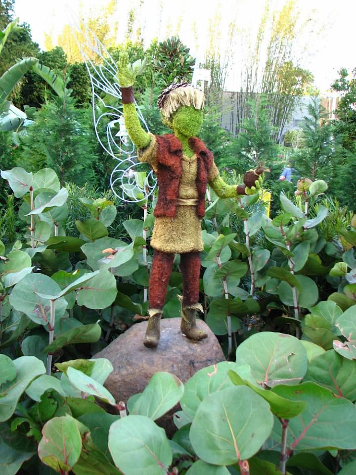 plant covered sculpture of Peter Pan at Epcot